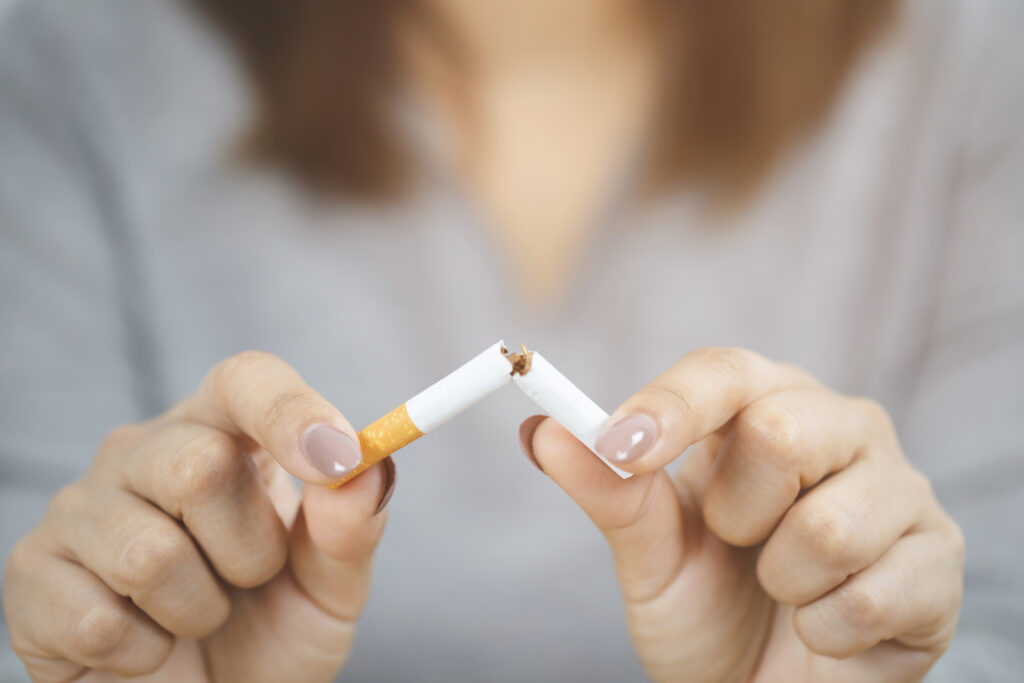 woman refusing cigarettes concept for quitting smoking and healthy lifestyle.or no smoking campaign concept.